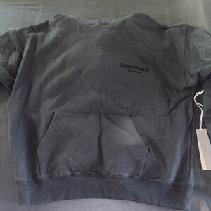 Black on black essentials hoodie new with tags
